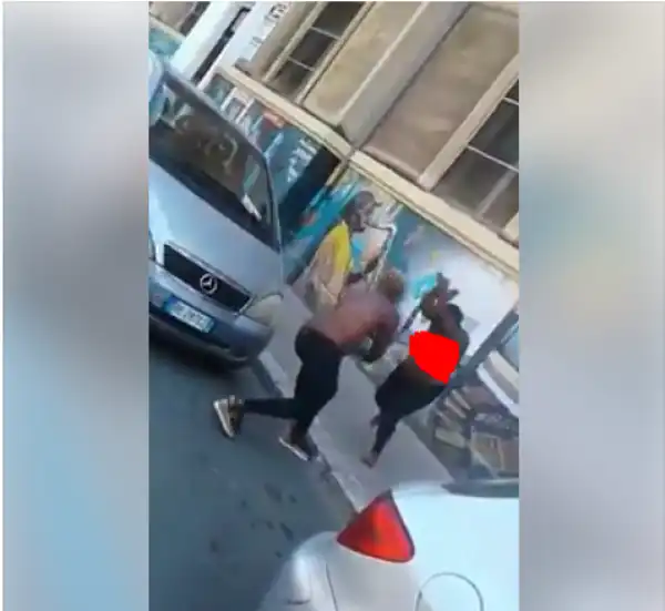 Two Nigerian Ladies Go Topless As They Fight On The Streets Of Italy. Photos